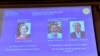 Pictures of the 2018 Nobel Prize laureates for chemistry: Frances H. Arnold of the United States, George P. Smith of the United States and Gregory P. Winter of Britain are displayed on a screen during the announcement at the Royal Swedish Academy of Scien