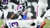 Buffalo Bills football player Damar Hamlin (3) lies on the ground after making a tackle on Cincinnati Bengals player Tee Higgins. After getting up from the play, Hamlin collapsed and was administered CPR on the field. (AP Photo/Joshua A. Bickel)