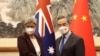 澳大利亞外長黃英賢2022年12月21日在北京會見時任中國外長王毅。（路透社轉發）