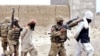 APP106-02SOUTH WAZIRISTAN: November 02 – Security officials apprehending terrorists during operation Rah-e-Najat in the area. APP