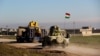 Kurdish peshmerga forces prepare for battle against the Islamic State group, near the Mosul Dam, in Iraq, Jan. 20, 2015.