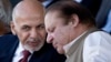 FILE - Afghan President Ashraf Ghani (left) talks with Pakistani Prime Minister Nawaz Sharif in Islamabad, Pakistan. 