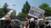 Pro-Islamic Turks, in support of ousted Egyptian President Mohammed Morsi shout slogans including "This is the home of the murderers" as they point toward the U.S embassy during a protest in Ankara, July 5, 2013.