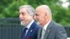 FILE - Afghanistan's President Ashraf Ghani, right, and Chief Executive Abdullah Abdullah arrive for sessions of the second day of the NATO Summit, in Warsaw, Poland, July 9, 2016.