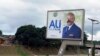 Photo d’archives) Un panneau d'affichage dégradé de l’ex-président gabonais Ali Bongo Ondimba - renversé le 30 août 2023 par un putsch militaire – à Libreville, au Gabon, le mercredi 30 août 2023. (AP Photo/Yves Laurent) 