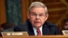 Sen. Robert Menendez, D-N.J. addresses fellow members of the Senate Banking Committee in Washington, Jan. 27, 2015.