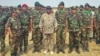 លោកនាយ​ឧត្តម​សេនីយ៍ ហ៊ីង ប៊ុនហៀង (កណ្តាល) អគ្គ​មេបញ្ជា​ការរង​នៃ​កង​យោធពល​ខេមរភូមិន្ទ និង​មេបញ្ជាការ​នៃ​បញ្ជាការ​ដ្ឋាន​អង្គរក្ស​សម្តេច​នាយករដ្ឋ​មន្ត្រី ហ៊ុន សែន ចូលរួម​ក្នុង​ពិធី​បិទ​វគ្គ​ហ្វឹកហ្វឺន​របស់​កង​ពលតូច​ទ័ព​ពិសេស​ឆត្រយោង ៩១១ នៅទីលាន​ក្តាន់រយ ឃុំសំបូរ ស្រុកសំរោងទង ខេត្តកំពង់ស្ពឺ កាលពី​ថ្ងៃទី១៥ មិនា ២០១៦។ (រូបថត​ដកស្រង់ពី​ទំព័រ​ហ្វេសប៊ុកឯកឧត្តម នាយឧត្តមសេនីយ៍ កិត្តិបណ្ឌិត ហុីង ប៊ុនហៀង) 