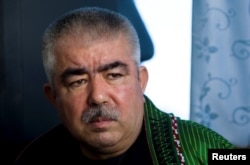 FILE - Abdul Rashid Dostum, who now is Afghanistan's first vice president, speaks during an interview with Reuters in Shibergan, in northern Afghanistan, Aug. 19, 2009.
