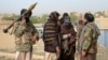 FILE - Members of the Taliban gather in Ghazni province, Afghanistan, April 18, 2015. Afghan officials and lawmakers continue to question and denounce Russia’s recent disclosure that it maintains “limited political” contacts with the Taliban.