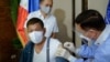 FILE - This handout photo taken May 3, 2021, and received from the Presidential Photo Division May 4, 2021, shows Philippine President Rodrigo Duterte receiving a dose of China's Sinopharm COVID vaccine at Malacanang Palace in Manila. (AFP)