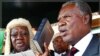 Zambia's new President Michael Sata, right, takes the oath of office on the steps of the supreme court in Lusaka, Zambia, September 23, 2011.
