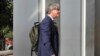 British BBC correspondent Jonathan Head enters the provincial court at the start of his trial, Aug. 23, 2017, on the southern island of Phuket, Thailand.