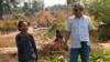 Im Chaem, 68, a former Khmer Rouge regional commander, in a picture with Youk Chhang, executive director of the Documentation Center of Cambodia, in Anlong Veng, February 13, 2012. (Courtesy of Documentation of Cambodia)