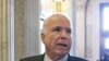 Senator John McCain talks to reporters on Capitol Hill, March 5, 2012.