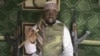 This file image taken from video posted by Boko Haram sympathizers made available on Wednesday, Jan. 10, 2012 shows Imam Abubakar Shekau, the leader of the radical Islamist sect Boko Haram.