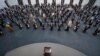 FILE - Syrian President Bashar al-Assad addresses the parliament, in Damascus, Syria, Aug. 12, 2020.