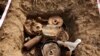 FILE - Landmines and debris from historic fighting are seen during the bomb disposal in Jebel Lemuni, 15km south of Juba, South Sudan, on January 30, 2019.