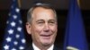 House Speaker John Boehner of Ohio smiles during a news conference on Capitol Hill in Washington, Nov. 6, 2014. 