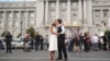 Lisa Dazols (R) and Jenny Chang celebrate after the U.S. Supreme Court ruled on California's Proposition 8 and the federal Defense of Marriage Act, outside the city hall in San Francisco, California, June 26, 2013. 