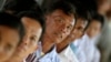 People line up to enter the Extraordinary Chambers in the Courts of Cambodia (ECCC), in the outskirts of Phnom Penh, Oct. 31, 2013. Khmer Rouge war crimes tribunal is hearing closing arguments.