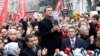 FILE - Turkey&#39;s main opposition Republican People&#39;s Party (CHP) mayoral candidate Mustafa Sarigul (C) speaks during a protest against Turkey&#39;s ruling AK Party and Prime Minister Tayyip Erdogan in Istanbul.