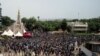 FILE - Supporters of the Imam Mahmoud Dicko and other opposition political parties attend a mass protest demanding the resignation of Mali's President Ibrahim Boubacar Keita at Independence Square in Bamako, Mali, June 5, 2020. 