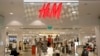 The company logo is placed at the flagship store of H&M, Hennes & Mauritz, HMb.ST, the world's second-biggest fashion retailer in Sweden's capital Stockholm, file photo. 