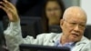 In this photo released by the Extraordinary Chambers in the Courts of Cambodia, Khieu Samphan, former Khmer Rouge head of state, gestures as he sits in the court room U.N.-backed war crimes tribunal in Phnom Penh, file photo. 