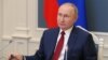 ប្រធានាធិបតី​រុស្ស៊ី លោក Vladimir Putin ចូលរួមកិច្ចប្រជុំវេទិកាសេដ្ឋកិច្ចពិភពលោកដែលធ្វើឡើងតាមប្រព័ន្ធអ៊ីនធឺណិត ពីទីក្រុងមូស្គូ ប្រទេសរុស្ស៊ី ថ្ងៃទី២៧ ខែមករា ឆ្នាំ២០២១។