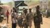 FILE - Cameroon troops watch for separatists in Cameroon's northwest region, Bamenda, Cameroon, May 24, 2019. 