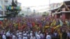 Supporters listen to Turkish Kurdish presidential candidate Selahattin Demirtas as he makes address in Mersin, Turkey, July 31, 2014.