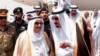 File - King Salman of Saudi Arabia (R) welcomes Kuwaiti Emir Sabah Al Ahmed Al Sabah upon his arrival to Riyadh Airbase before the opening of Gulf Cooperation Council summit in Riyadh, Saudi Arabia, May 2015.