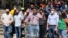El dirigente opositor venezolano Freddy Superlano ofrece una rueda de prensa en Caracas junto a compañeros, incluido el líder opositor, Juan Guaidó, el 29 de noviembre de 2021.