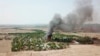 In this photo released by the Myanmar Army, a fire burns May 16, 2020, in the predominantly ethnic Rakhine village of Let Kar in Rakhine State's Mrauk-U township, western Myanmar. The Rakhine areas since January last year has been the scene of…