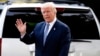 FILE - President Donald Trump waves as he walks to Marine One on the South Lawn of the White House.