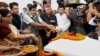 Bharatiya Janata Party (BJP) President Nitin Gadkari pays homage to martyrs of the 1962 India-China war before that start of a commemorative journey, in Gauhati, India, Oct. 18, 2012.