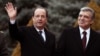 French President François Hollande walks with his Turkish counterpart Abdullah Gul during a welcome ceremony at the Cankaya Palace in Ankara, Turkey, Jan. 27, 2014. 