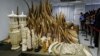 Journalists take pictures of the confiscated African ivory which will be destroyed as Hong Kong cracks down on an illegal wildlife trade that is devastating Africa's elephant population, Hong Kong, May 15, 2014.