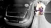 FILE - In this image from surveillance video aired by Iranian state television, women pull 16-year-old Armita Geravand from a train car on the Tehran Metro in Tehran, Iran, on Oct. 1, 2023.
