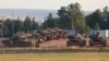 Turkish tanks positioned at a military base near the town of Suruc along the Syrian border, Sanliurfa province, Nov. 15, 2012.