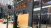 The Lapats Thai Noodle Bar is boarded up with plywood after being damaged from the explosion in Tenderloin, San Francisco, CA