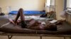 FILE- A child suffering from the Ebola virus receives treatment at Makeni Arab Holding Center in Makeni, Sierra Leone, Oct. 4, 2014.