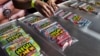 FILE - In this Saturday, Oct. 20, 2018 photo medicated High Chew edibles are shown on display and offered for sale at the cannabis-themed Kushstock Festival at Adelanto, Calif. (AP Photo/Richard Vogel)
