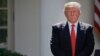 FILE - President Donald Trump stands next to the podium after speaking about the U.S. role in the Paris climate change accord in the Rose Garden of the White House in Washington, June 1, 2017. 
