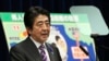 日本首相安倍晉2014年7月向記者解釋日本集體自衛權對聯防條約的重要性 （資料圖片） 