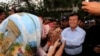 Cambodia National Rescue Party Deputy President Kem Sokha greets supporters during a rally in Phnom Penh, file photo. 