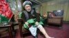 Ahmad Ishchi, who is alleged to have been beaten and detained by officials acting under the authority of Afghanistan's first vice president, Abdul Rashid Dostum, last month, displays an injury on his leg during an interview at his home in Kabul, Afghanistan, Dec. 13, 2016. 