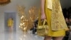 A model presents a creation by Chinese designer Guo Pei as part of her Haute Couture Spring/Summer 2016 collection in Paris, France, Jan. 27, 2016.