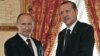 Turkish Prime Minister Recep Tayyip Erdogan, right, and Russian President Vladimir Putin shake hands at their meeting in Istanbul, Turkey, Monday, Dec. 3, 2012. 