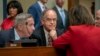 Rep. Jim Cooper, D-Tenn. (C), and Rep. Stephen F. Lynch, D-Mass. (L), confer with other Democrats as the House Oversight and Reform Committee considers whether to hold Attorney General William Barr and Commerce Sec. Wilbur Ross in contempt, June 12, 2019.